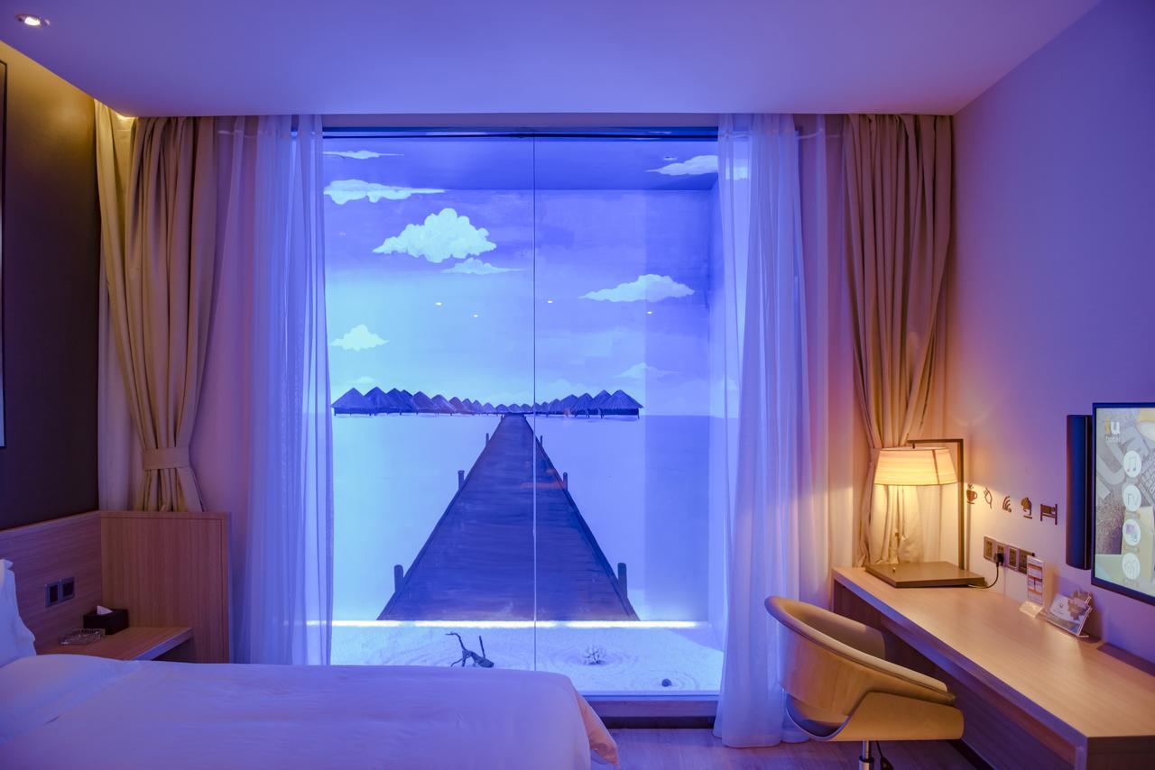 IU Hotel Ruoyang Yiyang Wenhua Road Bagian luar foto